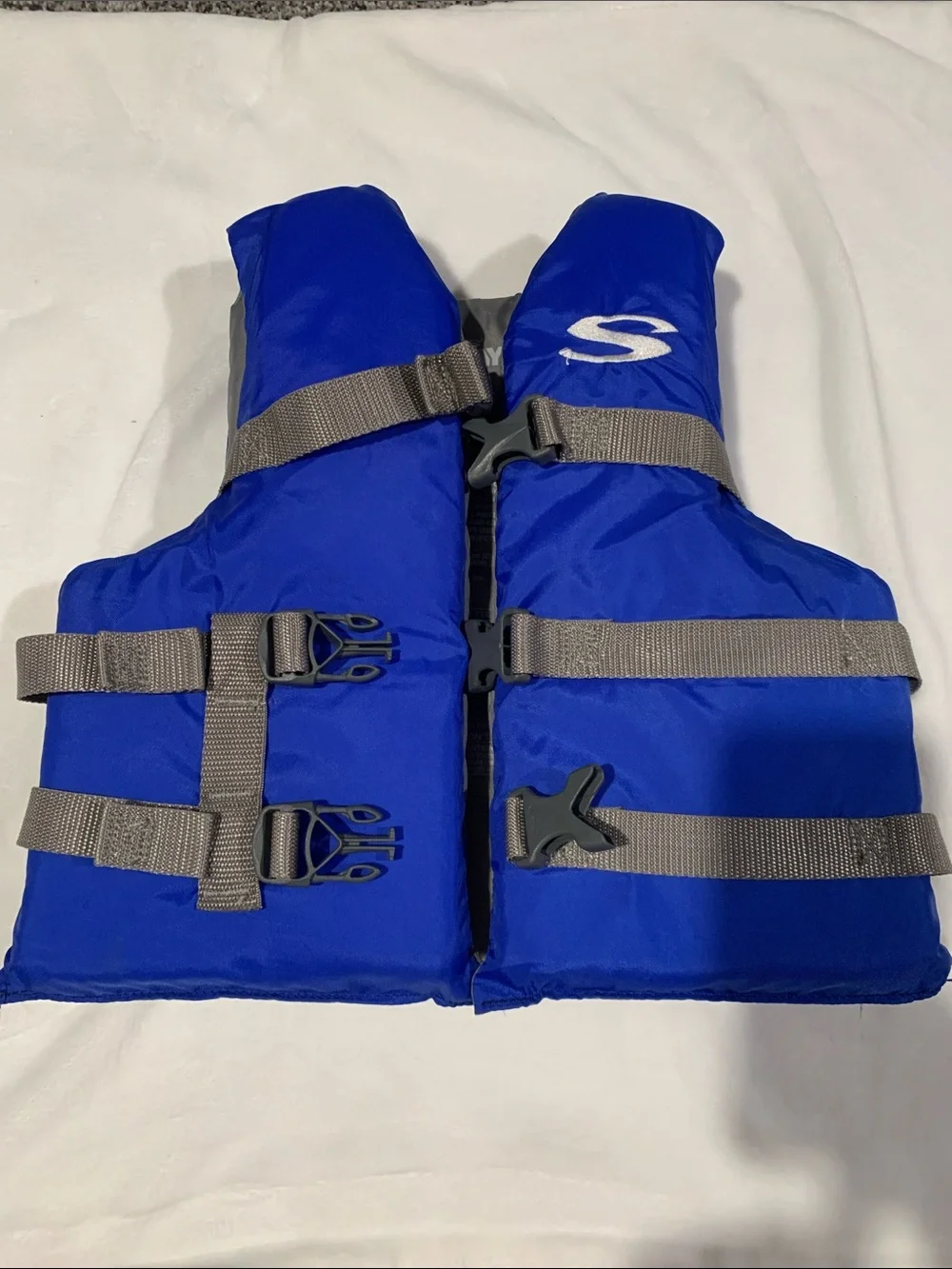 Youth Swim Life Jacket in Royal Blue with Adjustable Gray Straps